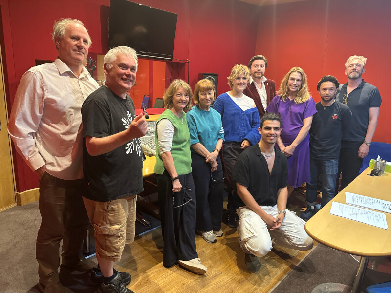 L-R (back row); Peter Davison, Matthew Waterhouse, Sarah Sutton, Janet Fielding, Evie Ward-Drummond, David K Barnes, Kelly Price, Michael Abubakar, Colin Tierney; (front row) Nuhazet Diaz Cano